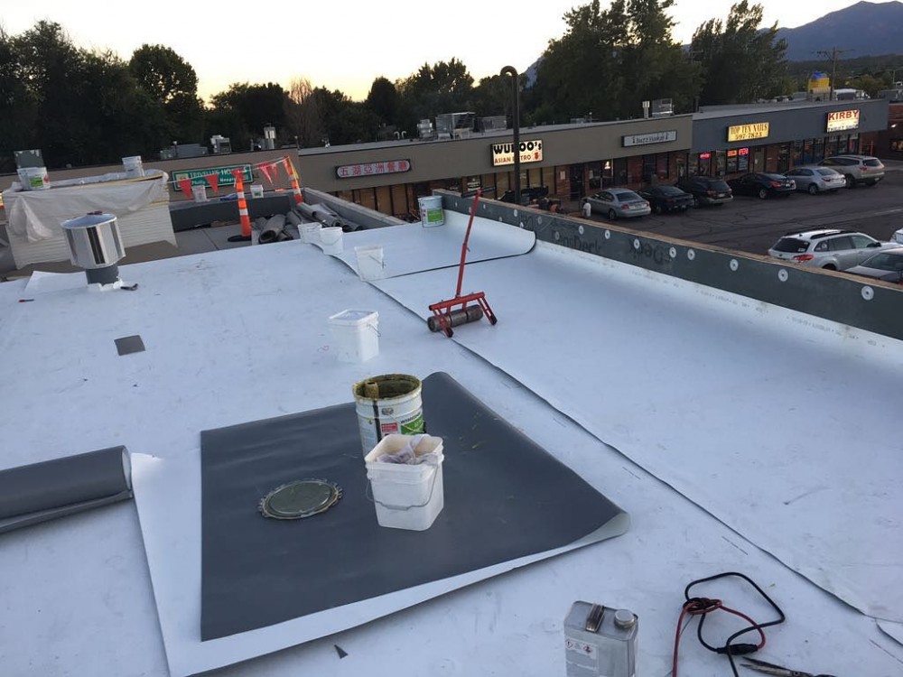 Photo By Divine Roofing, Inc.. Commercial Re-roof 
