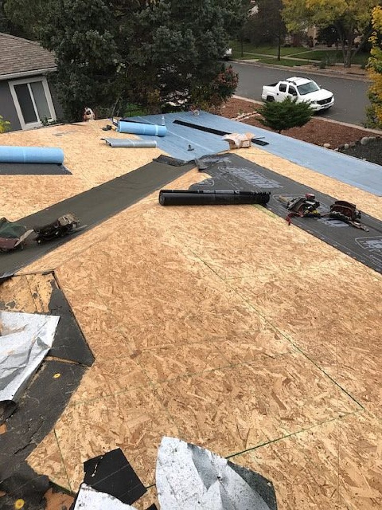 Photo By Divine Roofing, Inc.. Roof Replacement 