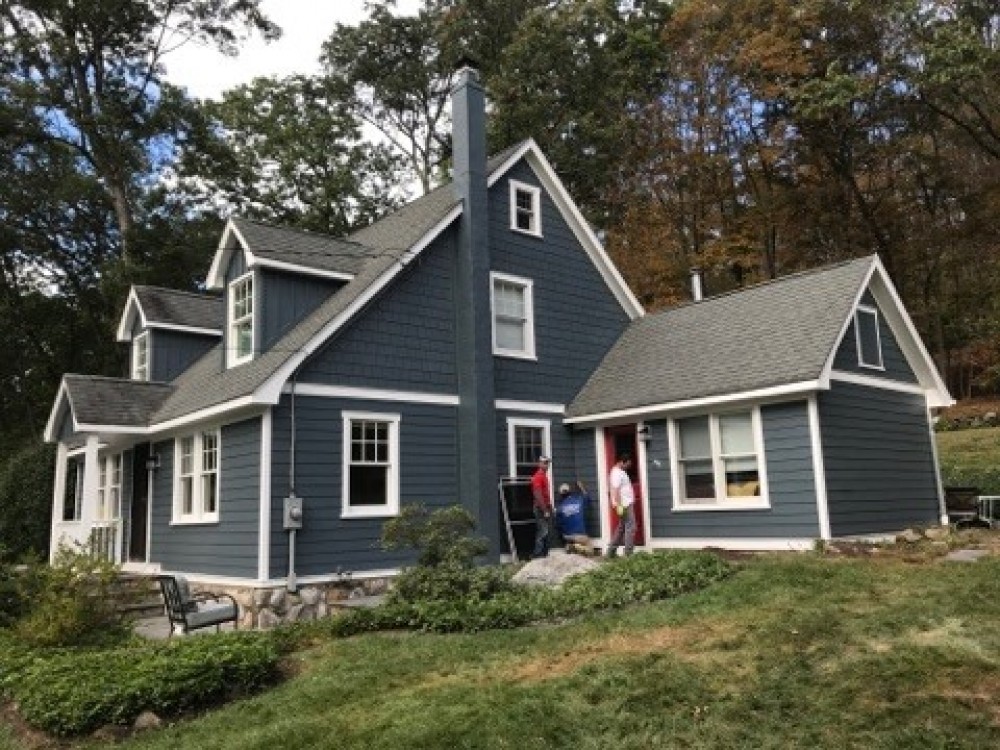 Photo By K & B Home Remodelers, LLC. James Hardie Siding