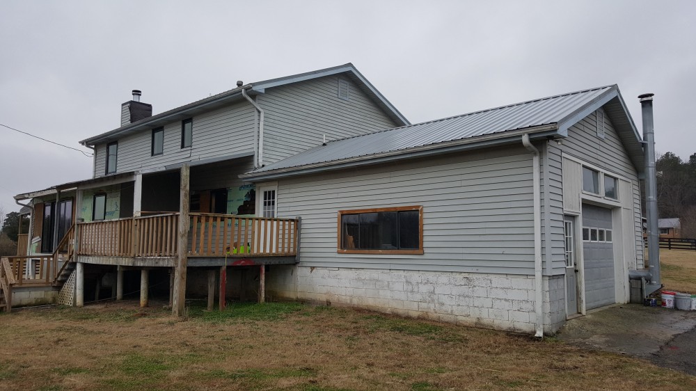 Photo By All American Exteriors. Farmhouse Remodel