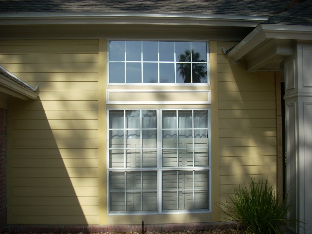Photo By Martin Home Exteriors. Hardie Plank