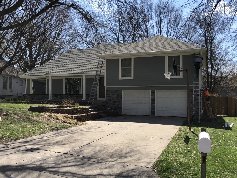 Photo By StateLine Exteriors. James Hardie Siding