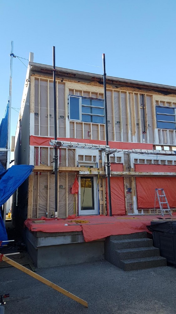 Photo By S.I.S. Exterior Renovations. James Hardie Siding - Stucco Panel