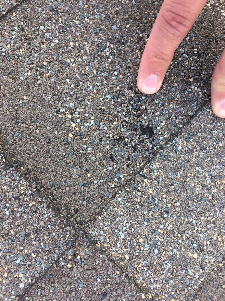 Photo By Advantage Construction Inc. HAIL DAMAGE