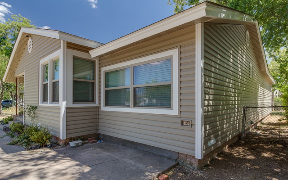 Photo By Woodbridge Home Exteriors. Siding
