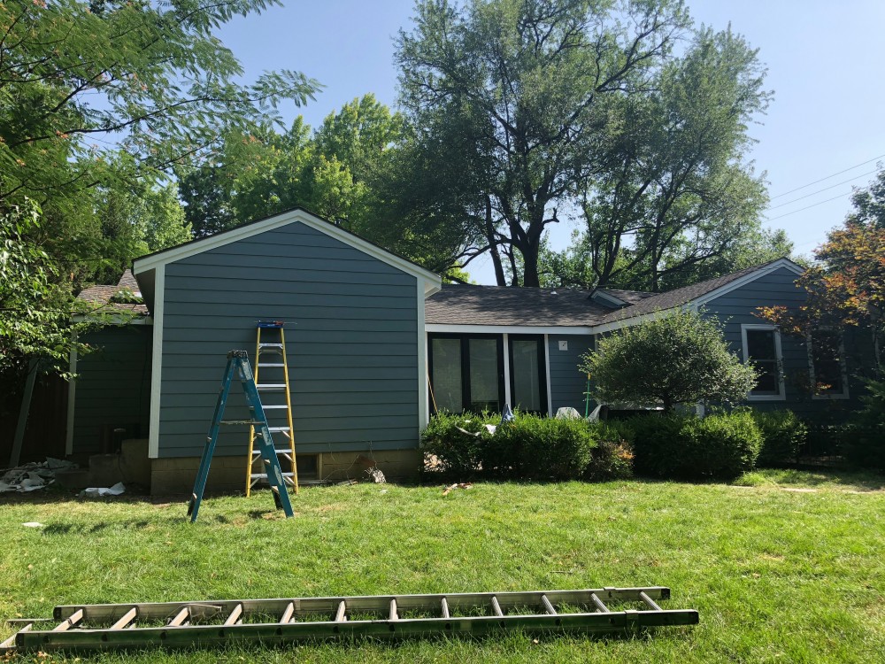 Photo By StateLine Exteriors. James Hardie Fiber Cement Siding