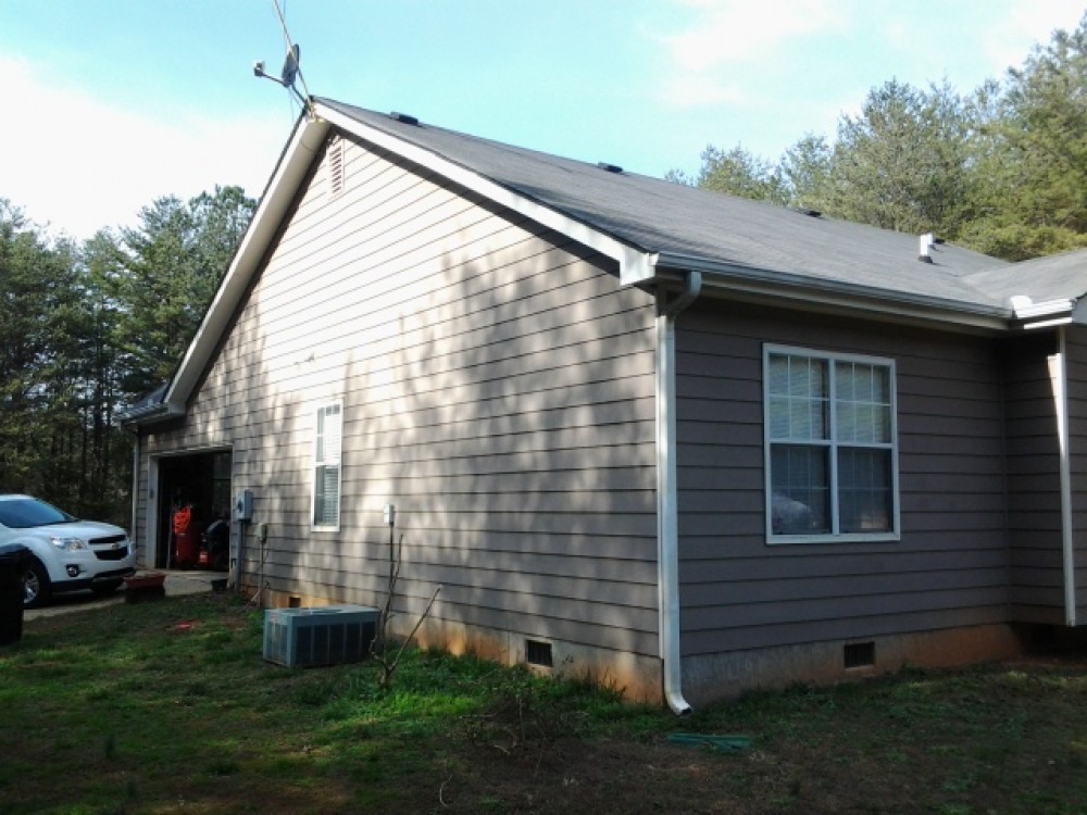 Photo By All American Exteriors. Sherwin Williams Emerald Paint