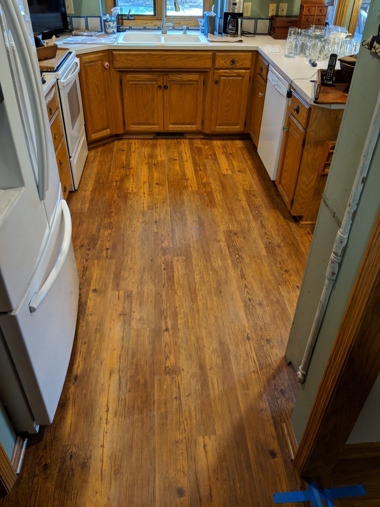 Photo By JL Construction LLC. COREtec Plus Flooring