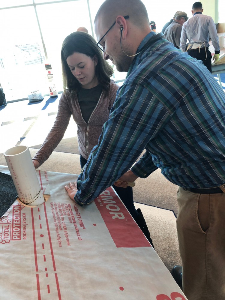 Photo By Signature Exteriors (NC). Team Building - Roofing University