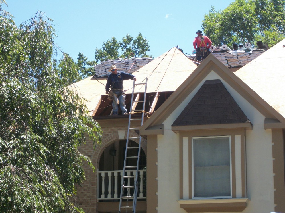 Photo By Gutterman Services Inc.. Residental Roof Installations
