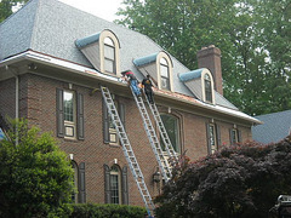 Photo By Gutterman Services Inc.. Residental Roof Installations