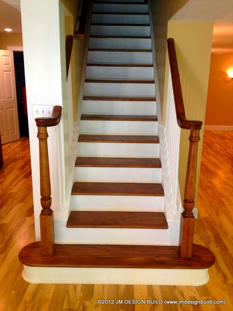 Photo By JM Design Build & Remodeling. Basement Finishing Richfield, OH