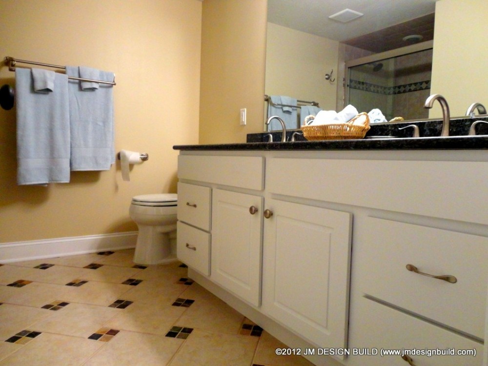 Photo By JM Design Build & Remodeling. Basement Finishing Richfield, OH
