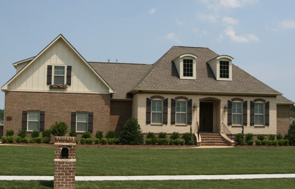 Photo By SYNCON, LLC.. Custom Homes