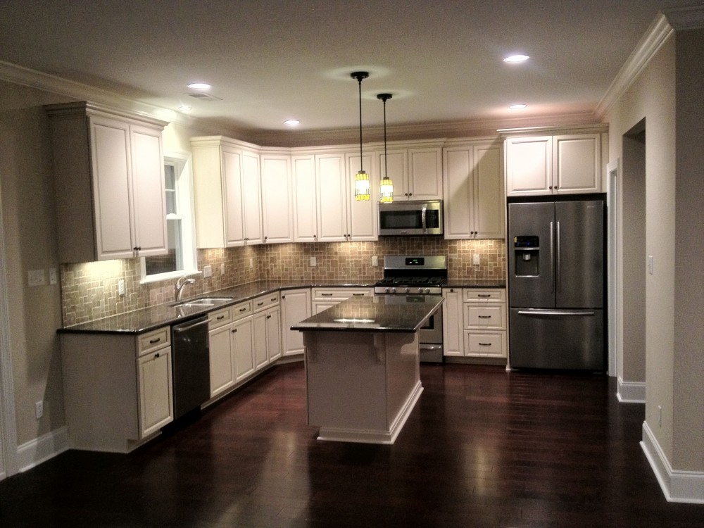 Photo By SYNCON, LLC.. Kitchens