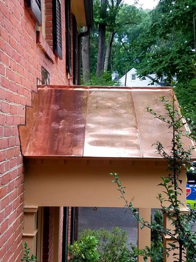 Photo By BRAX Roofing. Copper Roof Over Front Door 