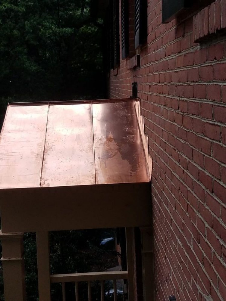 Photo By BRAX Roofing. Copper Roof Over Front Door 