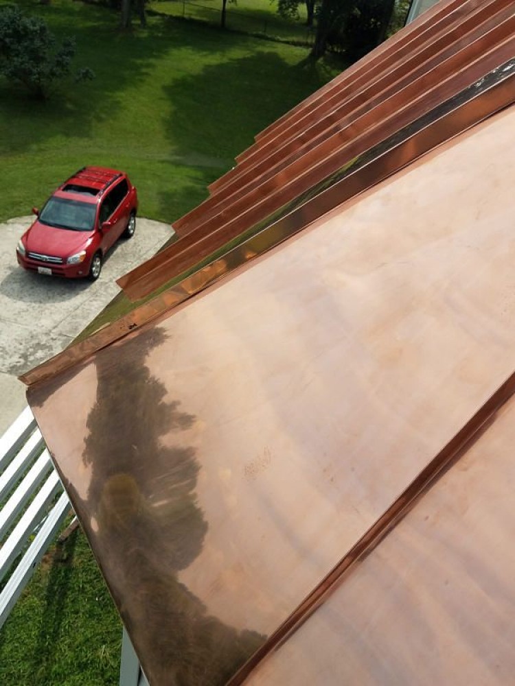Photo By BRAX Roofing. Copper Standing Seam Bay Window 