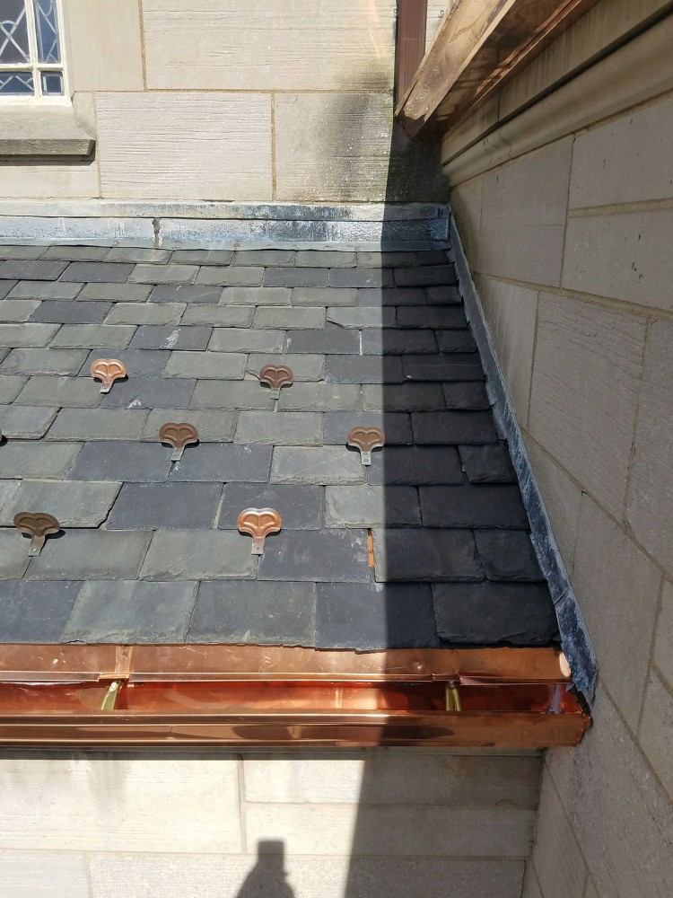 Photo By BRAX Roofing. New Seamless Half Round Copper Gutters And Snow Guards. 