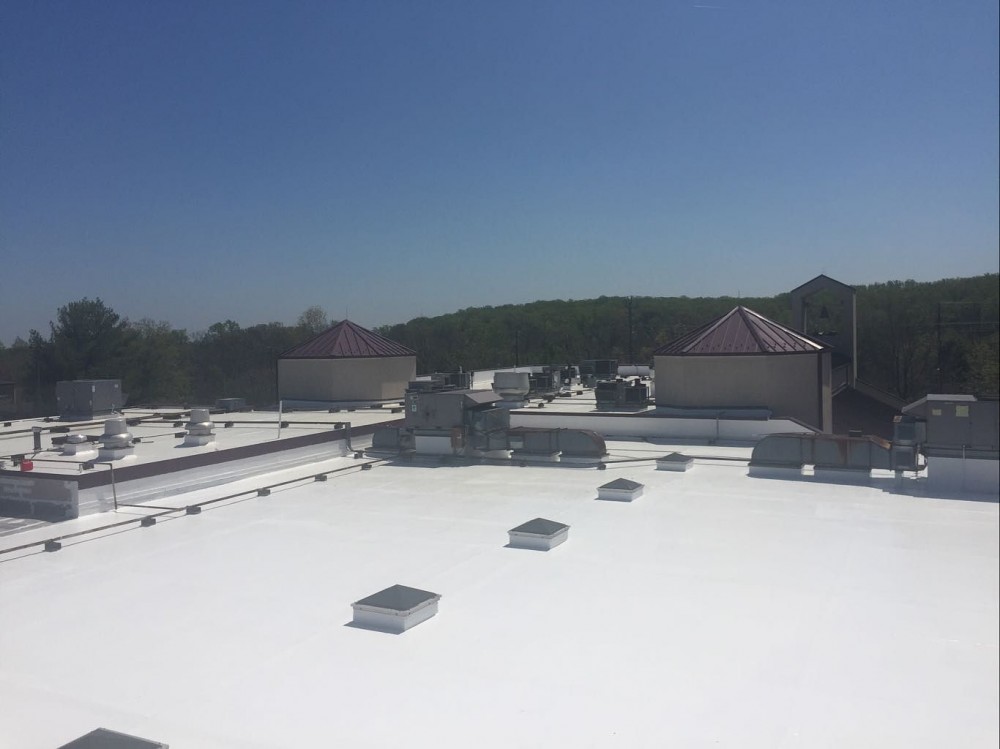 Photo By BRAX Roofing. New Silicone Roof Coating For Flat Roof. 