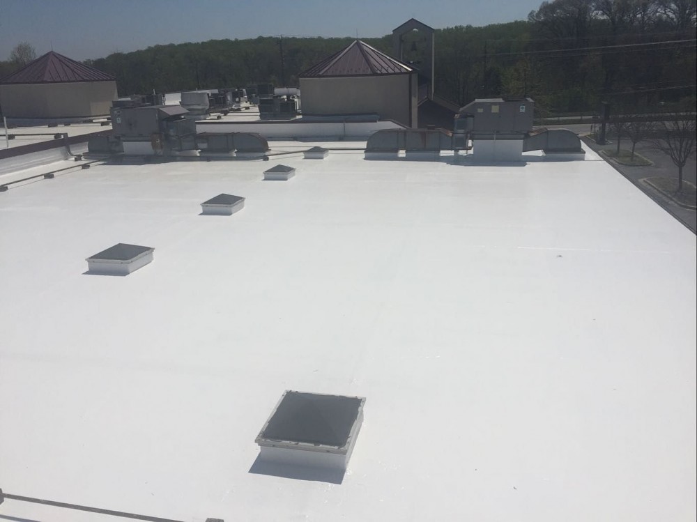 Photo By BRAX Roofing. New Silicone Roof Coating For Flat Roof. 