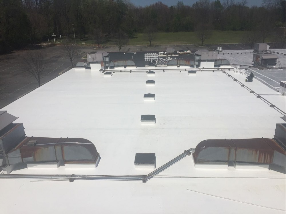 Photo By BRAX Roofing. New Silicone Roof Coating For Flat Roof. 