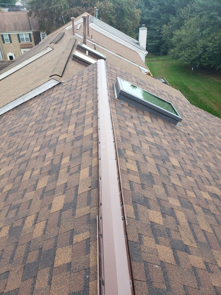 Photo By BRAX Roofing. Owens Corning Duration Shingle Roof Replacement With Velux Skylights