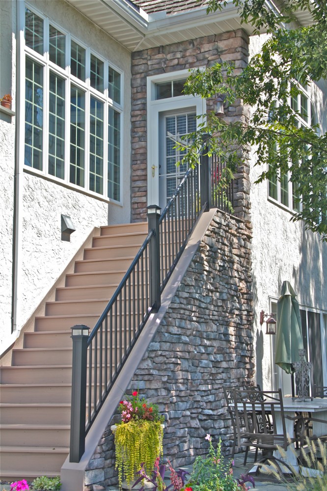 Photo By EBY Exteriors Inc.. Rivera Stairs, Railing & Stone