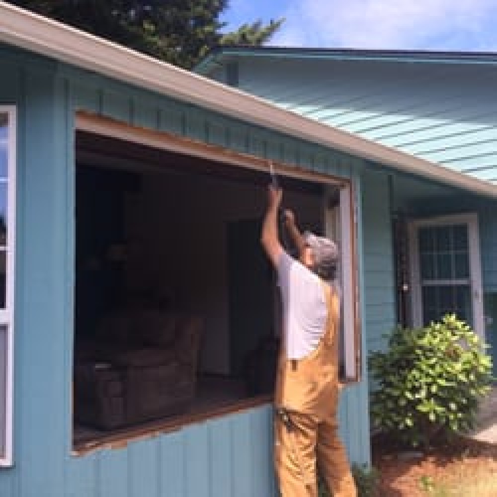 Photo By Energy Exteriors NW LLC. Window Replacement