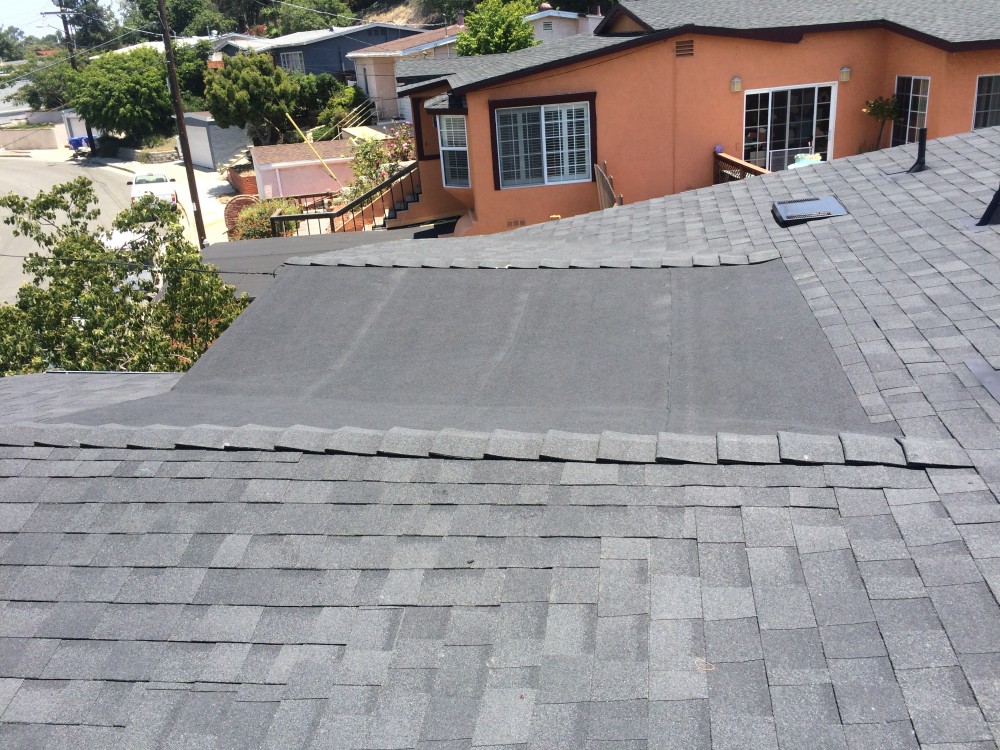 Photo By Elite Roof Services. OC Onyx Black Duration Shingles