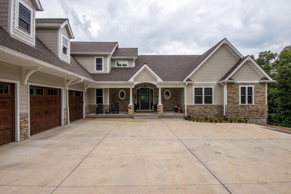 Photo By STL Siding Pros. Cobblestone James Hardie Siding With Arctic White Trim