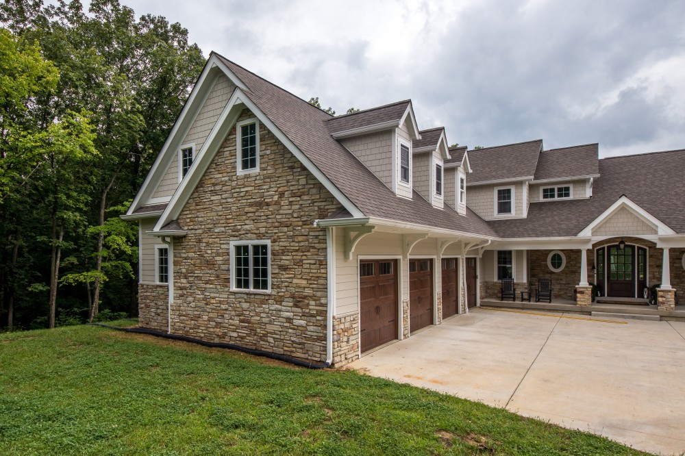 Photo By STL Siding Pros. Cobblestone James Hardie Siding With Arctic White Trim