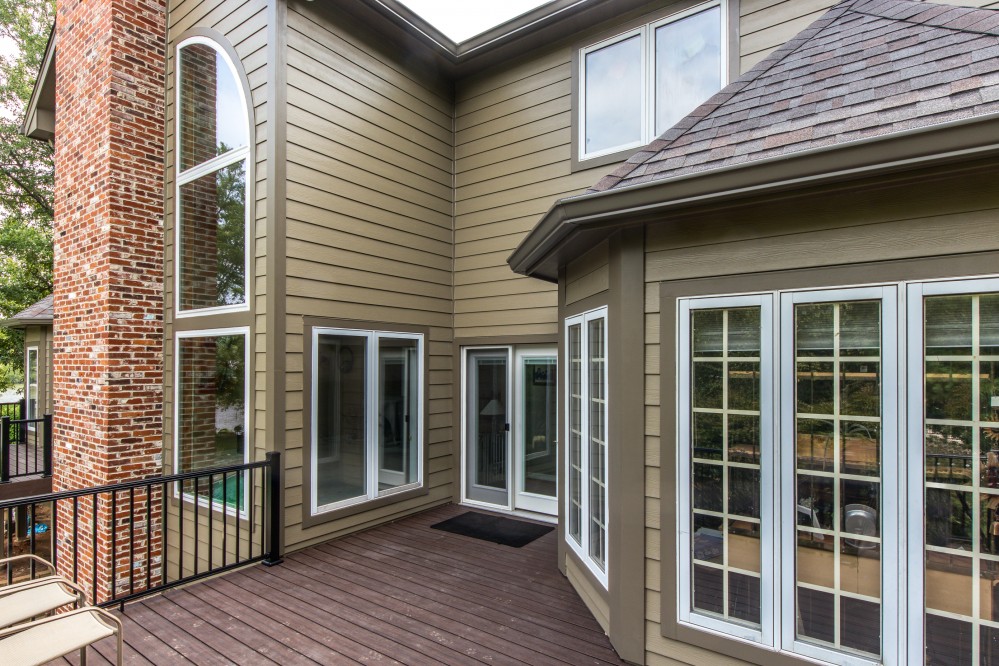 Photo By STL Siding Pros. James Hardie Woodstock Brown Siding With Woodstock Brown Trim