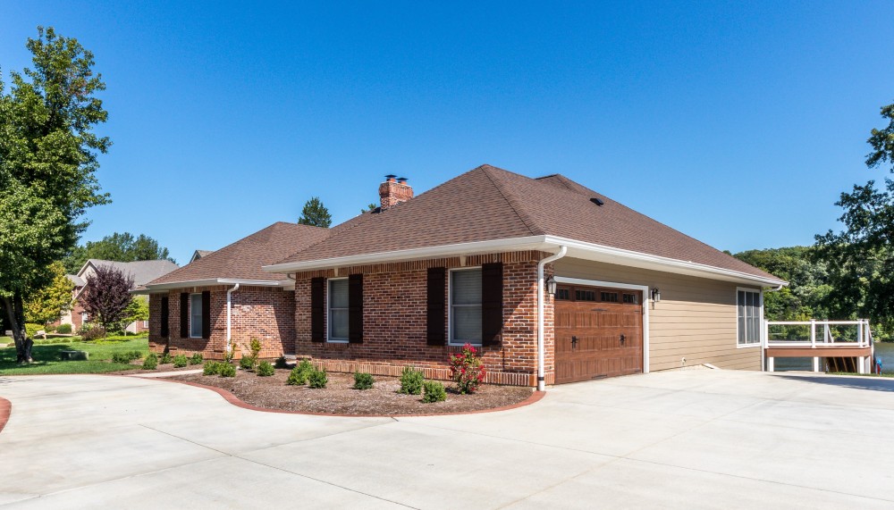 Photo By STL Siding Pros. Khaki Brown James Hardie Siding 