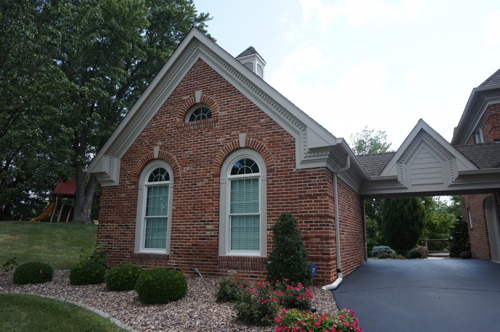 Photo By STL Siding Pros. Cobblestone James Hardie Siding With Arctic White Trim