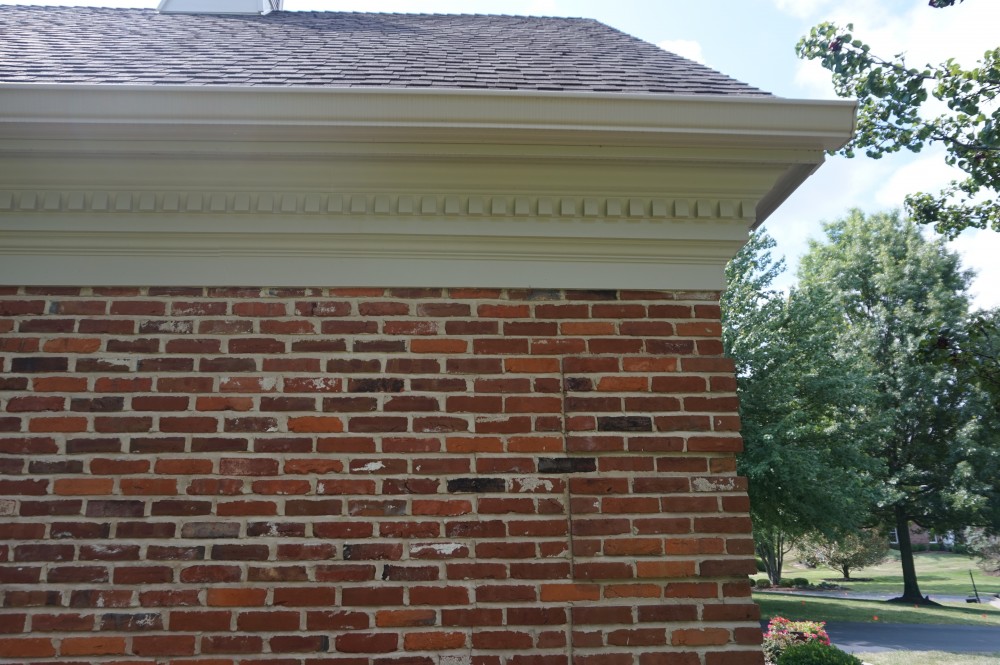 Photo By STL Siding Pros. Cobblestone James Hardie Siding With Arctic White Trim