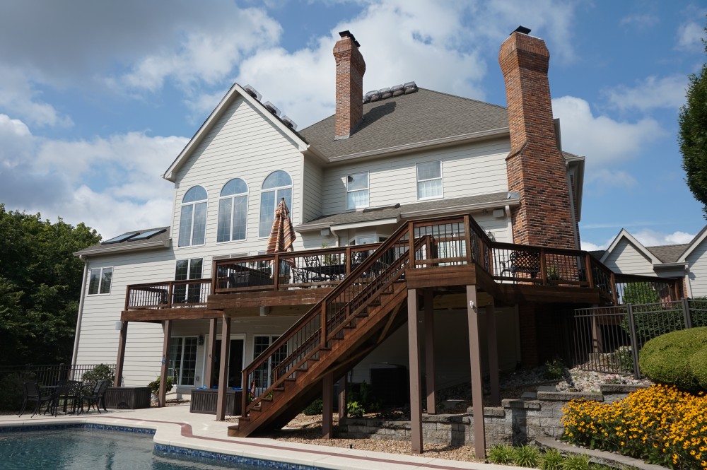 Photo By STL Siding Pros. Cobblestone James Hardie Siding With Arctic White Trim