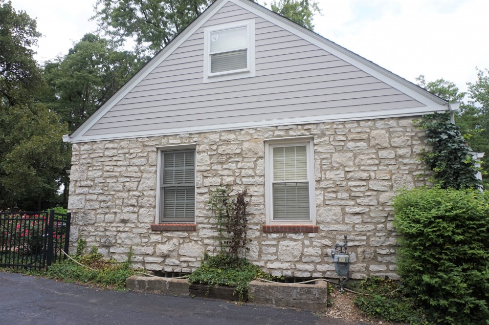 Photo By STL Siding Pros. Pearl Gray James Hardie Siding With Arctic White Trim