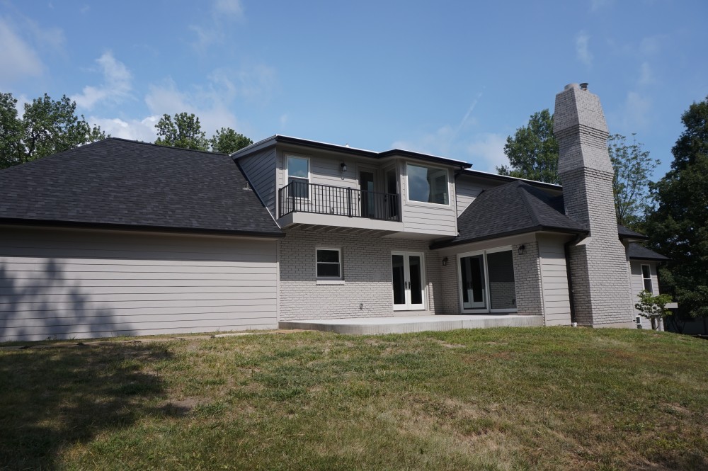 Photo By STL Siding Pros. James Hardie Siding In Pearl Gray 