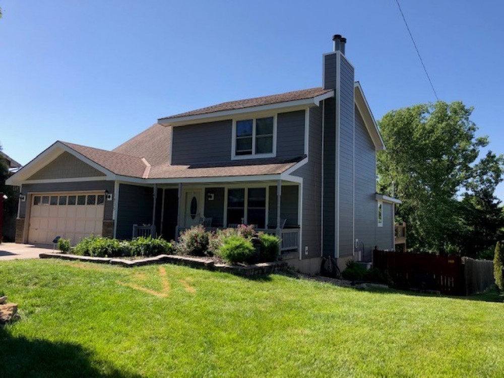 Photo By StateLine Exteriors. James Hardie Siding Aged Pewter And Monterey Taupe Shingles