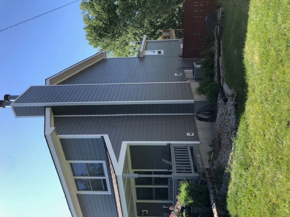 Photo By StateLine Exteriors. James Hardie Siding Aged Pewter And Monterey Taupe Shingles