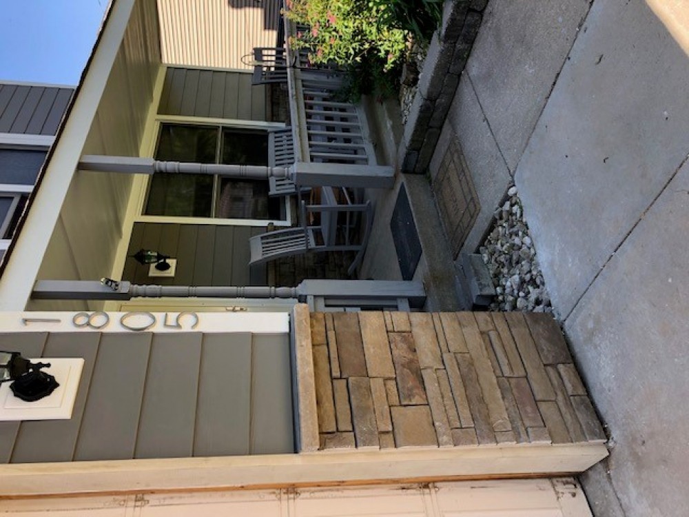 Photo By StateLine Exteriors. James Hardie Siding Aged Pewter And Monterey Taupe Shingles