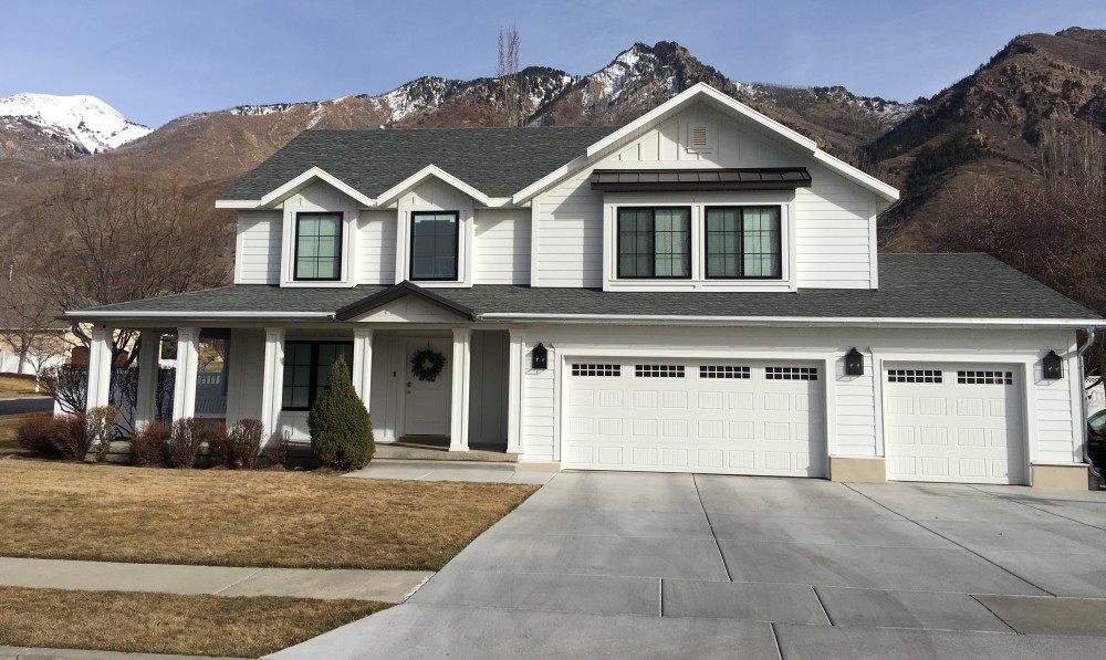 Photo By RGS Exteriors. James Hardie Fiber Cement