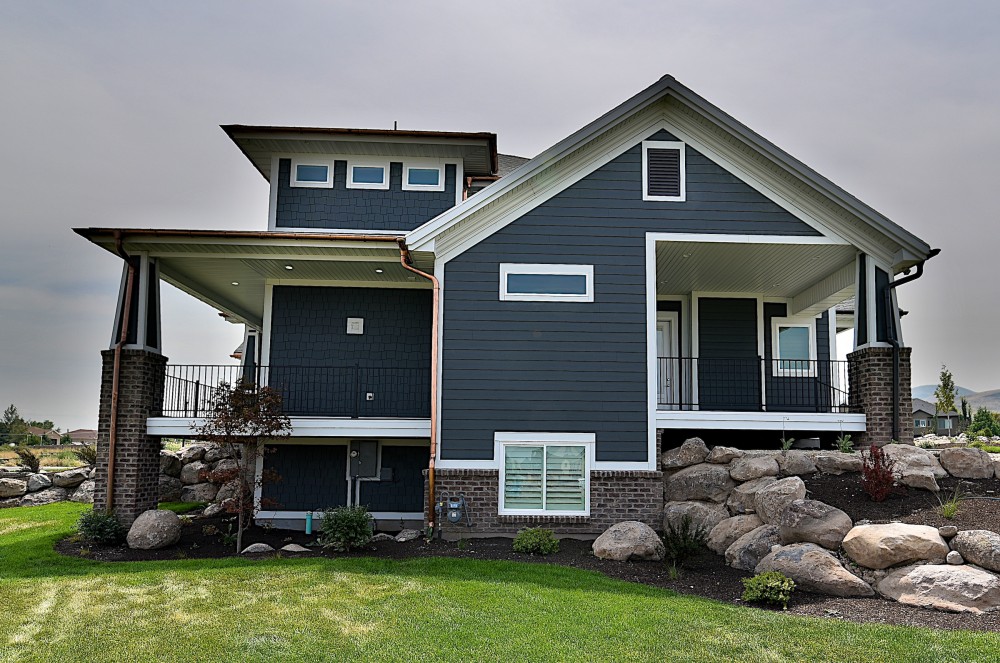 Photo By RGS Exteriors. James Hardie Fiber Cement