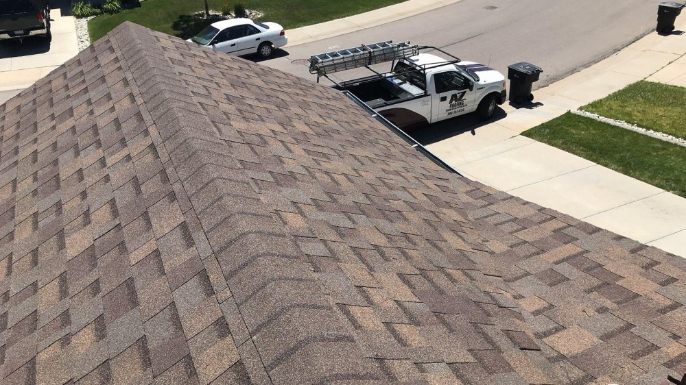 Photo By A To Z Roofing & Exteriors. 