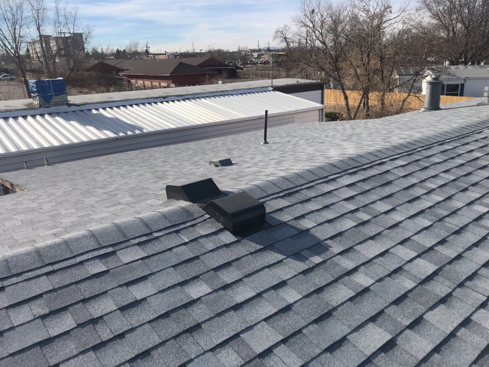 Photo By A To Z Roofing & Exteriors. 