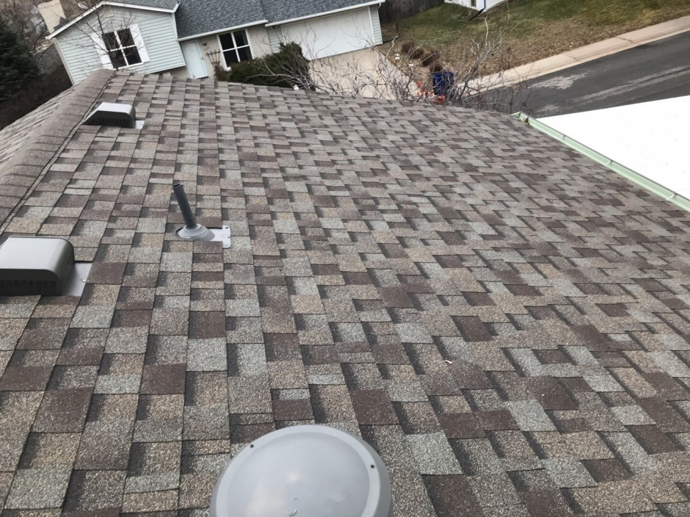 Photo By A To Z Roofing & Exteriors. 
