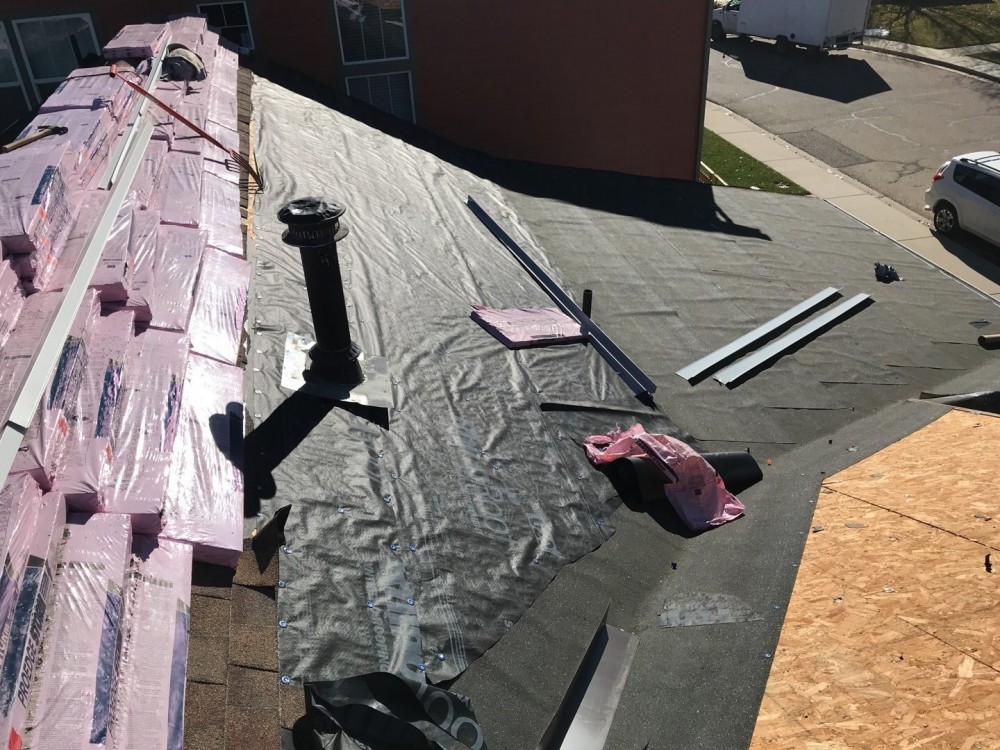 Photo By A To Z Roofing & Exteriors. 