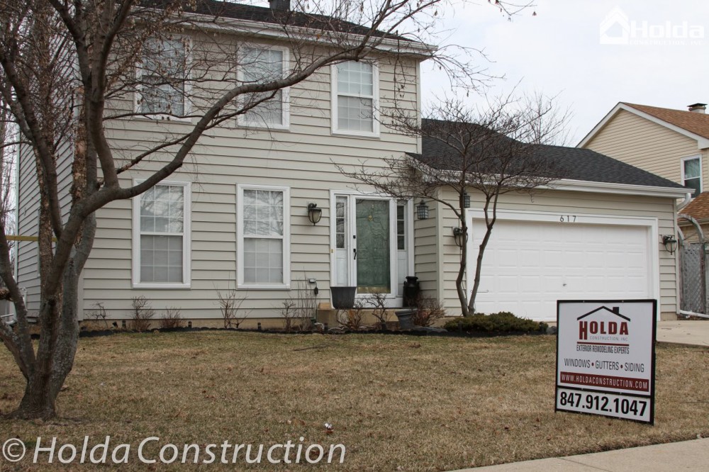 Photo By Holda Construction. Insulated Siding ,Windows Clad