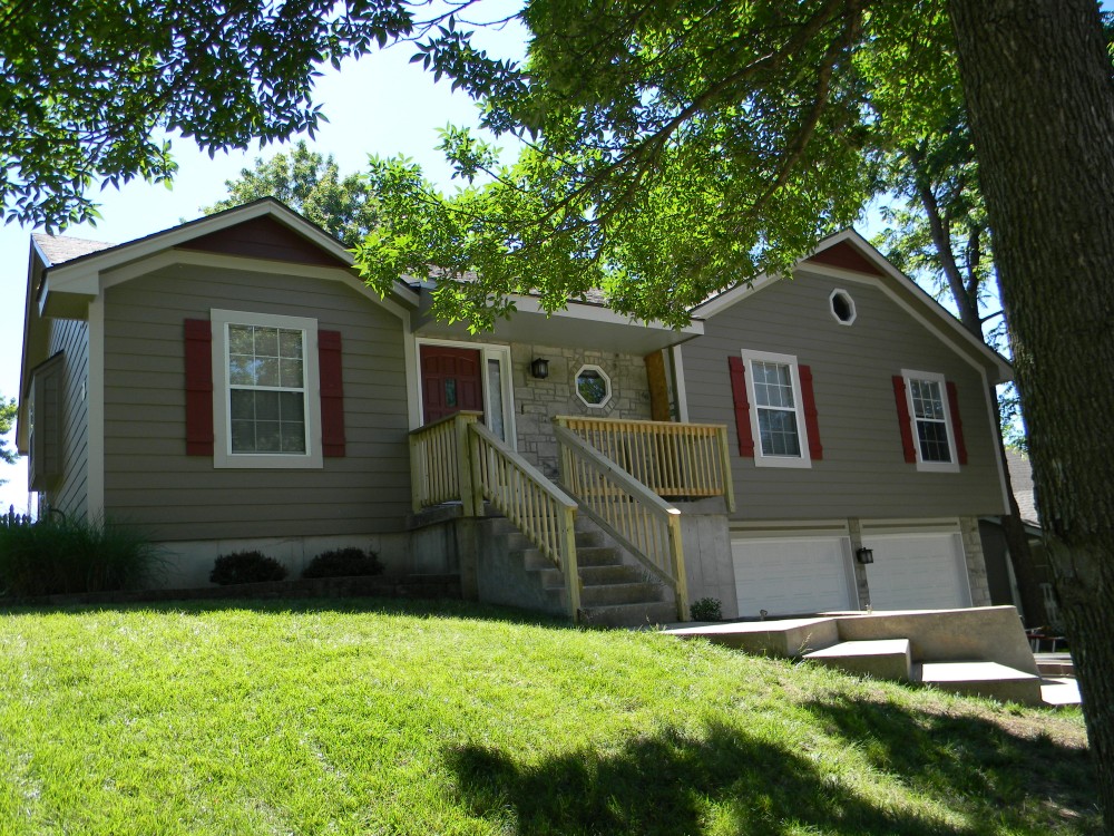 Photo By Integrity Roofing, Siding, Gutters & Windows. Complete James Hardie Color Plus System In Lees Summit, MO